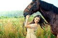 Pretty woman with horses