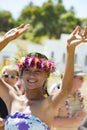 Pretty woman hula dancing on South Pacific Ocean, Aitutaki, Cook Islands Royalty Free Stock Photo