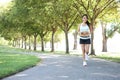 Pretty Woman Jogging in Park