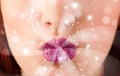 Pretty woman lips blowing abstract white lights Royalty Free Stock Photo