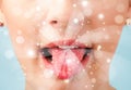 Pretty woman lips blowing abstract white lights Royalty Free Stock Photo