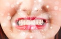 Pretty woman lips blowing abstract white lights Royalty Free Stock Photo