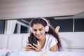 Pretty woman listening song on her smartphone Royalty Free Stock Photo