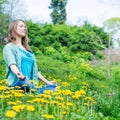 Pretty woman meditate in the park Royalty Free Stock Photo