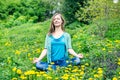 Pretty woman meditate in the park Royalty Free Stock Photo