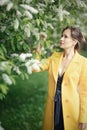 Pretty woman near blossom tree, spring time Royalty Free Stock Photo