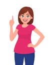 Pretty woman pointing up index finger at copy space and smiling. Human emotion and body language concept illustration in vector. Royalty Free Stock Photo