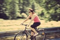 Pretty woman riding a bicycle