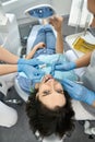 Pretty woman`s teeth treatment in dental clinic Royalty Free Stock Photo