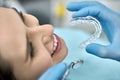 Pretty woman`s teeth treatment in dental clinic