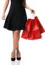 Pretty woman and sale, detail photo, female legs with sale bags