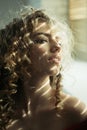 Pretty woman. Shiny curly hair .Curly hair woman. Beautiful hair, portrait of an young girl. Charming woman. Wavy Hair