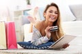Pretty woman shopping online with credit card Royalty Free Stock Photo