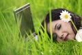 Pretty woman sleeping on laptop outdoor Royalty Free Stock Photo