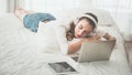 Pretty woman sleeping next to her laptop computer Royalty Free Stock Photo