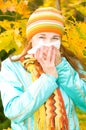 Pretty woman sneeze. flu Royalty Free Stock Photo