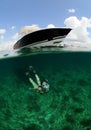 Pretty woman snorkeling underwater