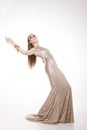 Pretty woman in a sparkling gala dress Royalty Free Stock Photo