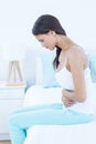 Pretty woman suffering from stomach pain Royalty Free Stock Photo