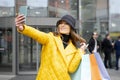 Pretty woman taking selfie after the shopping. Happy lifestyle, holiday discounts, sales