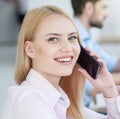 Pretty woman is talking on telephone Royalty Free Stock Photo