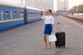 Pretty woman at the train station Royalty Free Stock Photo