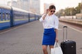 Pretty woman at the train station Royalty Free Stock Photo
