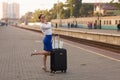 Pretty woman at the train station Royalty Free Stock Photo