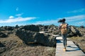 Pretty woman traveler walking on wooden walkway Royalty Free Stock Photo