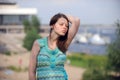 Pretty woman from Volgograd on the shore of the great Russian river Volga inflates Royalty Free Stock Photo