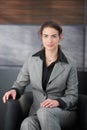 Pretty woman waiting for job interview in hall Royalty Free Stock Photo