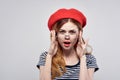 pretty woman wearing a red hat makeup fashion posing Fresh air Royalty Free Stock Photo