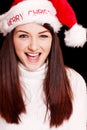 Pretty woman wearing santa hat