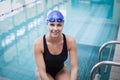 Pretty woman wearing swim cap and goggles Royalty Free Stock Photo