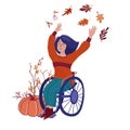 Pretty woman in wheelchair happy in fall, autumn