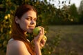 pretty woman in white dress with apples in hands fruit nature