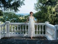 pretty woman in white dress in the park greece decoration princess