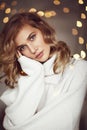 Pretty woman in white sweater Royalty Free Stock Photo