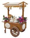 Pretty wooden portable traditional italian picturesque ice cream cart with umbrella on white background for easy selection - image