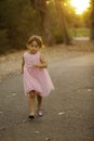 Pretty 3 1/2 year old Asian-Caucasian girl in pink dress Royalty Free Stock Photo