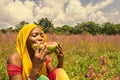 pretty young african woman eating watermelon outside Royalty Free Stock Photo