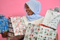 pretty young african woman holding plenty gift boxes feeling excited and happy Royalty Free Stock Photo