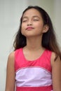 Youthful Filipina Girl Child With Eyes Closed Royalty Free Stock Photo