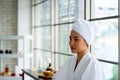 Pretty young Asian woman on bed getting spa massage facil service Royalty Free Stock Photo