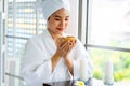 Pretty young Asian woman on bed getting spa massage facil service Royalty Free Stock Photo