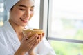 Pretty young Asian woman on bed getting spa massage facil service Royalty Free Stock Photo