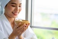 Pretty young Asian woman on bed getting spa massage facil service Royalty Free Stock Photo