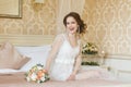 Pretty young Bride. Boudoir morning of the bride. Royalty Free Stock Photo