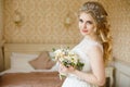 Pretty young Bride. Boudoir morning of the bride. Royalty Free Stock Photo