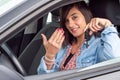 Pretty young brunette driving car Royalty Free Stock Photo